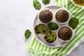 Spinach muffins. Healthy, vegan green muffins, top view. Copy space Royalty Free Stock Photo