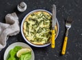 Spinach ricotta frittata on a dark stone background. Healthy delicious breakfast Royalty Free Stock Photo