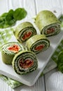 Spinach rolls with smoked salmon and cream cheese. Royalty Free Stock Photo