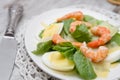 Spinach salad with eggs and shrimp