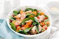 Spinach, salmon and sweetpotato festive thansgiving salad with pomegranate