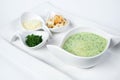 Spinach soup puree in a white bowl with croutons Royalty Free Stock Photo