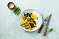 Spinach waffles with fried egg and cheese Royalty Free Stock Photo