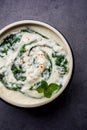 Spinach Yogurt Salad or Palak Raita served in a bowl