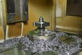 Spindle chuck and installed metal part on high precision Cnc industrial lathe turning machine. Metal part after processing on a Royalty Free Stock Photo