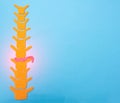 Spine on a blue background. The concept of intervertebral hernia and back protrusion. Modern methods of hernia treatment,