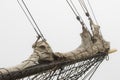 Spinnaker furled on the bowsprit of a tall ship Royalty Free Stock Photo