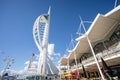 Spinnaker Tower and eateries located on the harbour front of Gunwharf Quay outlet shopping centre in Portsmouth, Hampshire, UK