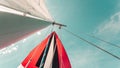 Spinnaker with uphaul, blue sky in background Royalty Free Stock Photo