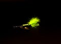 Spinner Lure with three hooks spinnerbaits pulsating hackle tail isolated on black Royalty Free Stock Photo