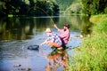 Spinnerbait. fly fish hobby of men in checkered shirt. retirement fishery. happy fishermen friendship. Two male friends Royalty Free Stock Photo