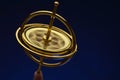Gyroscope balanced on finger tip Royalty Free Stock Photo