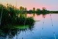 Spinning with a coil for evening fishing on the lake or river Royalty Free Stock Photo