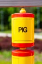 Spinning cylinder with the word pig at a playground Royalty Free Stock Photo