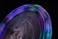 Spinning ferris wheel in motion Royalty Free Stock Photo