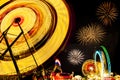 Spinning ferris wheels at night Royalty Free Stock Photo