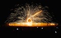 Spinning fire Show at night on the beach Royalty Free Stock Photo