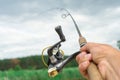 Spinning fishing is an exciting activity. Sport fishing. Royalty Free Stock Photo