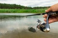 Spinning fishing is an exciting activity. Sport fishing. Copy space. Royalty Free Stock Photo