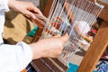 Spinning frame with wool fabrics Royalty Free Stock Photo