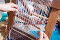 Spinning frame with wool fabrics Royalty Free Stock Photo