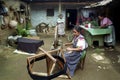 Spinning Guatemalan Indian woman working at home