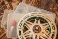 spinning lures in the box and fishing reel Royalty Free Stock Photo