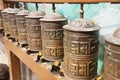 Spinning prayer wheels at Bodnath Temple, Nepal