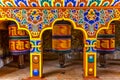 Spinning prayer wheels inside of Luentshe Dzong monastery in Lhuntse, Bhutan