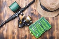 Fishing tools on a wooden table Royalty Free Stock Photo