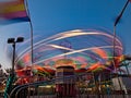 County Fair ride, at night, in motion. Gwinnett County, GA. Royalty Free Stock Photo