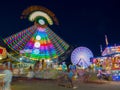 County Fair ride, at night, in motion. Gwinnett County, GA. Royalty Free Stock Photo