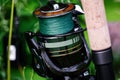 Spinning rod, reel, fishing line Royalty Free Stock Photo