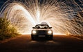 spinning steel wool behind classic Mercedes-Benz W126.