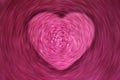 Spinning and swirling motion blur pink heart.