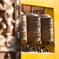 Spinning Tibetan Buddhist prayer wheels in Kathmandu Royalty Free Stock Photo