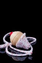 Spinning top with rope on black background Royalty Free Stock Photo
