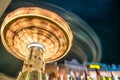 Spinning wheel game blurred movement in the amusement park