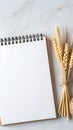 Blank Spiral Notebook with Wheat and Twine on Marble Background Royalty Free Stock Photo