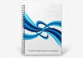 Spiral bound notebook with abstract blue wave design isolated on white background Royalty Free Stock Photo