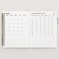 Pages. The left page features an undated monthly calendar with columns Royalty Free Stock Photo