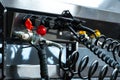 Spiral cable connecting truck cabin and trailer. Pneumatic hoses and electric cables on the coupler of the hitch between a tractor Royalty Free Stock Photo