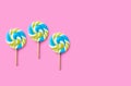 Spiral candy colorful lollipop round on colored background, birthday, birthday