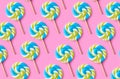 Spiral candy colorful lollipop on colored background, birthday, birthday