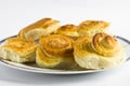 Spiral cinnamon French buns on white background. Royalty Free Stock Photo