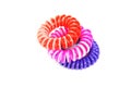 Spiral colorful elastic hair ties isolated on a white background Royalty Free Stock Photo