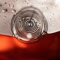 Spiral in glass teapot spout. Metal spiral, tea strainer. Close up shot. Macro image
