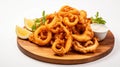 Spiral Group: Innovative Techniques For Fried Octopus On Wooden Plate