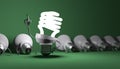 Spiral light bulb character standing and tungsten ones lying