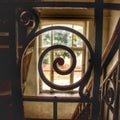 Spiral looking at a window in a abandoned decaying building in europe